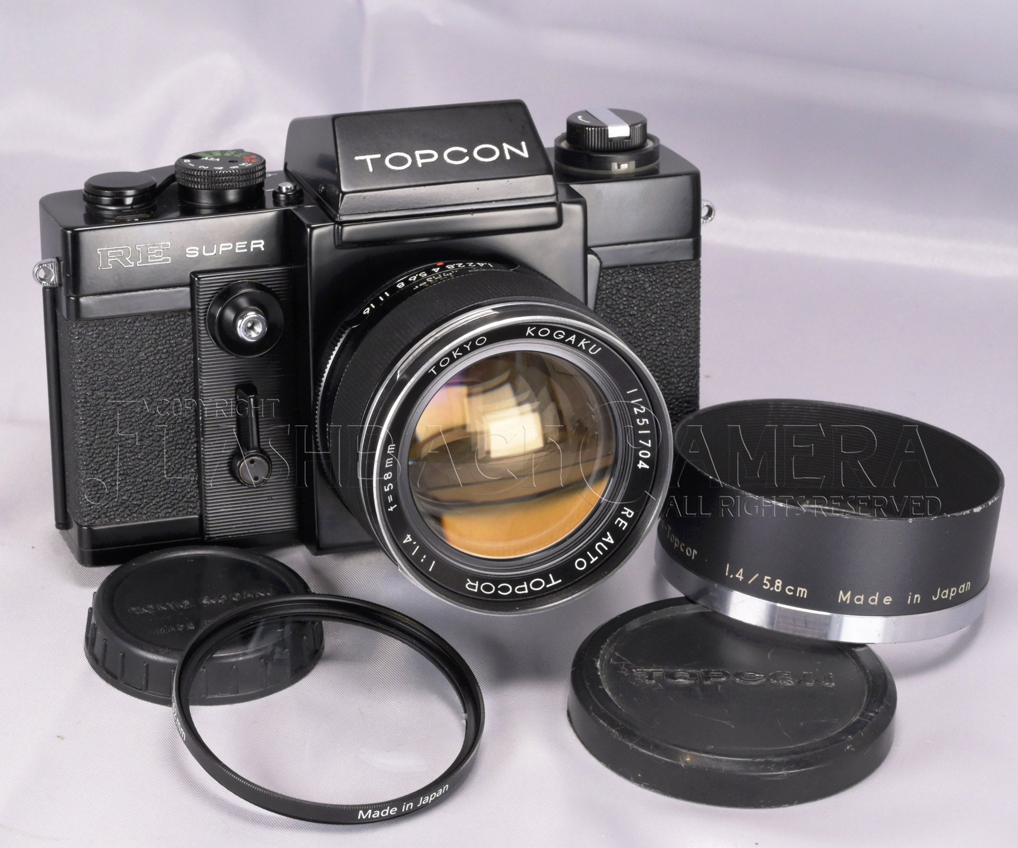 Lot 169 - A Topcon RE Super 35mm SLR Camera Outfit Lot 169 - A Topcon RE Super 35mm SLR Camera Outfit